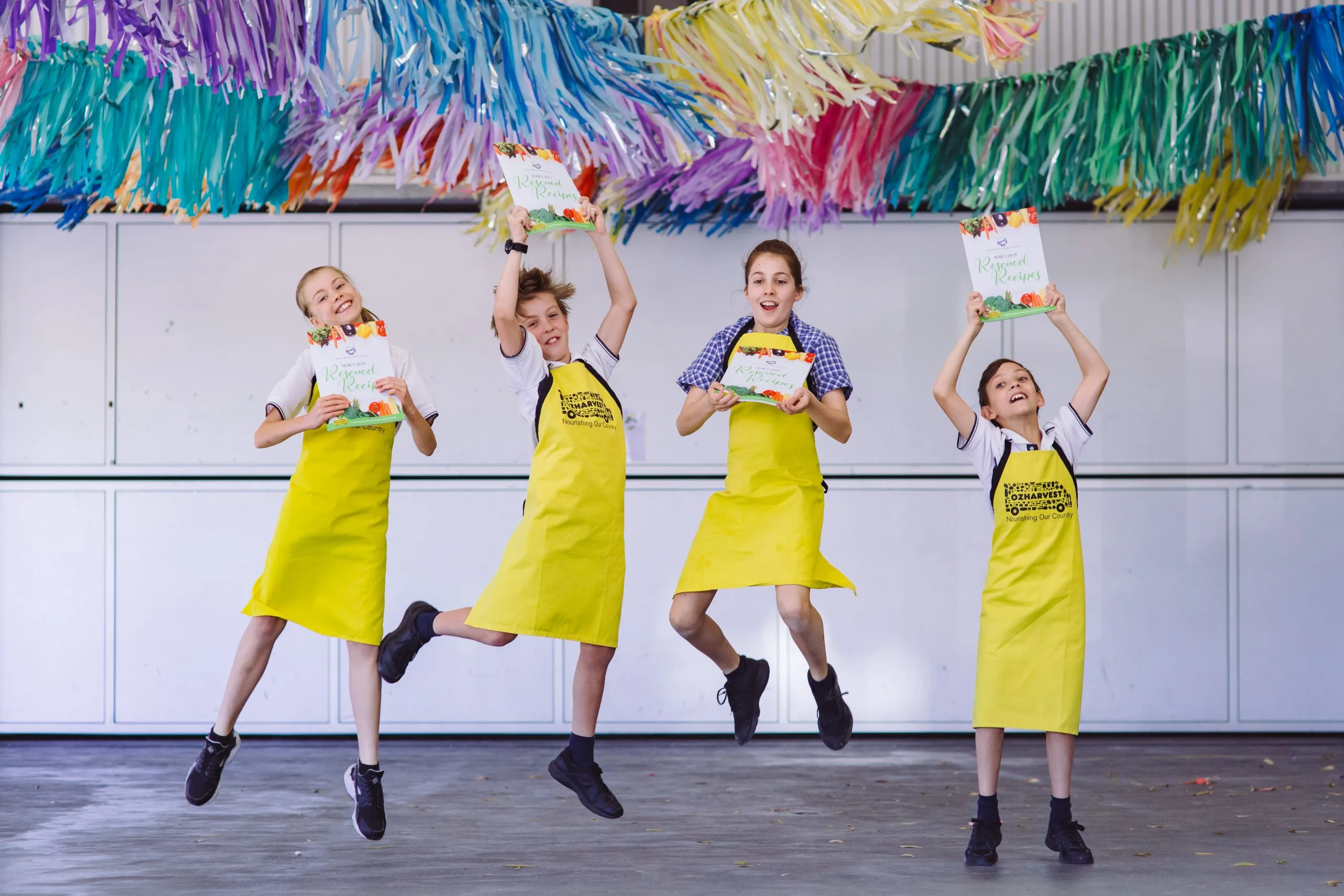 FEAST_Students jumping_Bellevue Hill Launch_credit Lucy Leonardi