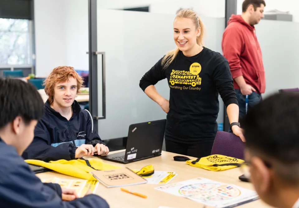 OzHarvest dietitian smiling during a NEST session.